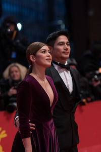 Young couple standing outdoors