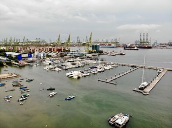High angle view of boats moored at harbor