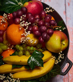 High angle view of fruits in bowl on table