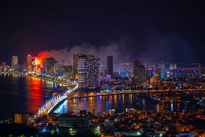 Night city life, lighting and salute. metropolis nighttime, aerial view.