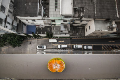 High angle view of orange slice in city