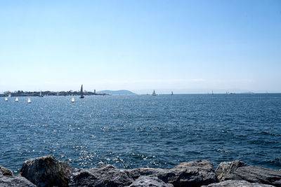 Scenic view of sea against clear sky