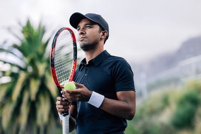 Young man playing tennis