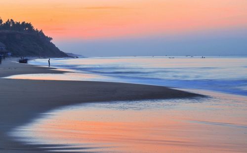 Scenic view of beach during sunset