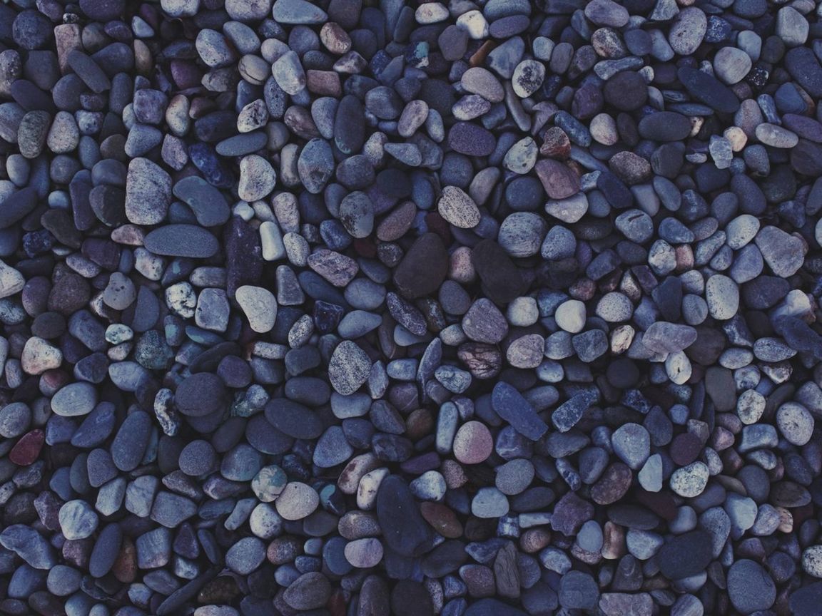 FULL FRAME SHOT OF PEBBLES ON BEACH