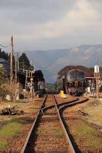 Railroad track against sky