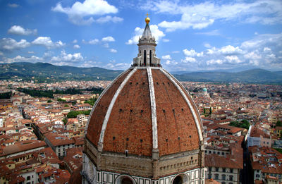 High angle view of florence cathedral against cloudy sky