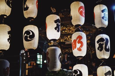 Low angle view of lanterns hanging in restaurant