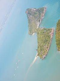 High angle view of island amidst sea