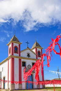 Colonial-style chapel decorated with ribbons for a religious celebration in  town of lavras novas