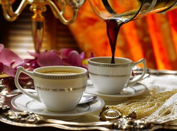 Close-up of coffee served on table