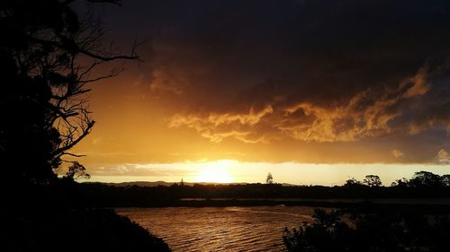 Scenic view of landscape against cloudy sky