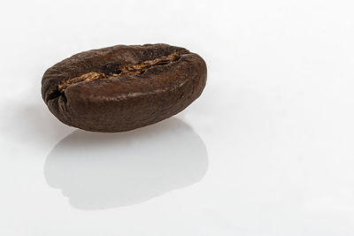 Close-up of bread against white background