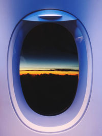 Scenic view of sky seen through airplane window