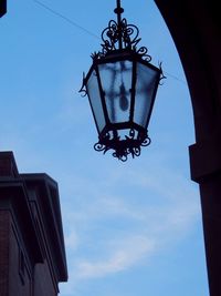 Low angle view of street light against sky