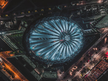 Low angle view of illuminated ferris wheel at night