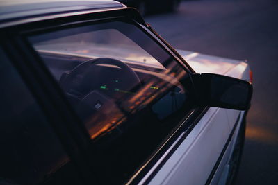 Close-up of car on side-view mirror