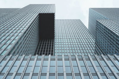 Low angle view of modern building against sky in city