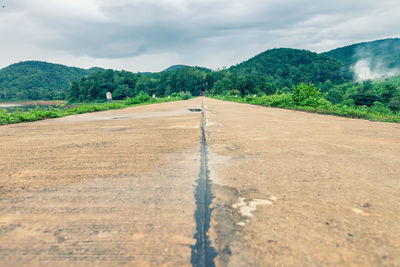 Surface level of road against sky