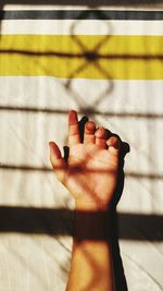 Close-up of hand on table