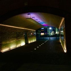 Empty walkway at night