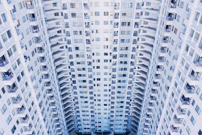 Low angle view of modern buildings in city