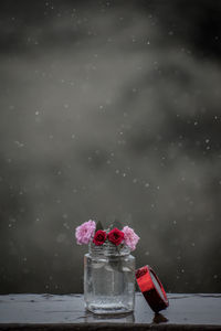 Close-up of red rose in snow