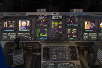 Low angle view of illuminated airplane at home