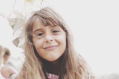 Close-up portrait of smiling girl