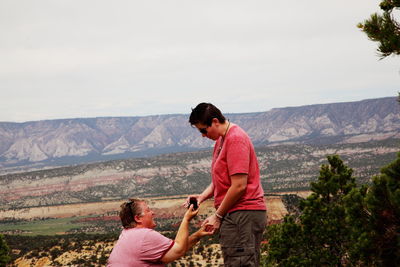 Lesbian woman proposing wife at dinosaur national monument