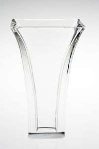 Close-up of wineglass against white background