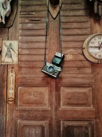 Directly above shot of clock on table
