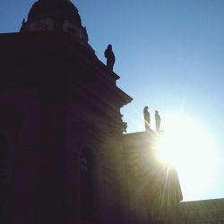 Low angle view of built structure against blue sky