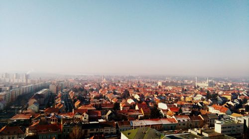 Cityscape against clear sky