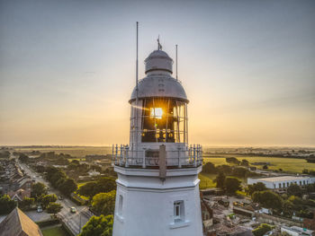 High angle view of building against sky during sunset