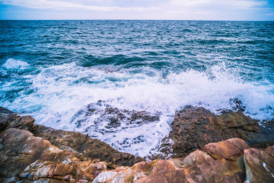 Sea with smooth wave and rock landscape. nature of seascape in vacation holiday travel relax time.