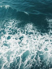 High angle view of surf on beach