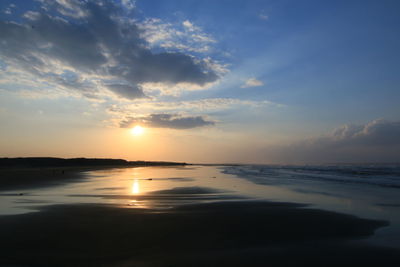 Scenic view of sea against sky during sunset