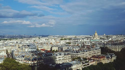 Aerial view of cityscape against sky