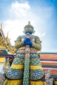 Low angle view of temple against building