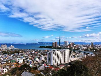 Cityscape with sea in background