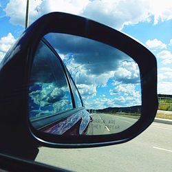 Reflection of car on glass window