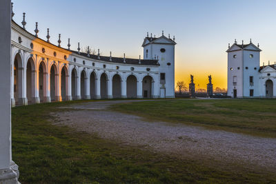 Sunset between the columns. ancient residence of the doge of venice. udine. italy