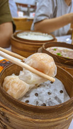 Midsection of man preparing food