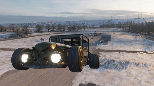 Vintage car on snow covered landscape