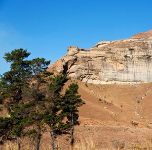 Scenic view of rocky mountains against clear sky