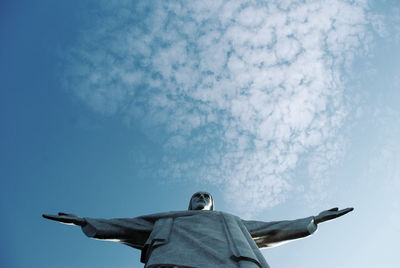 Low angle view of statue against sky