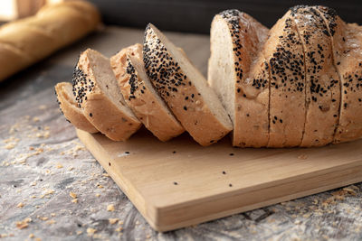 High angle view of bread on cutting board