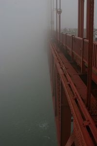 Golden gate bridge over bay during foggy weather