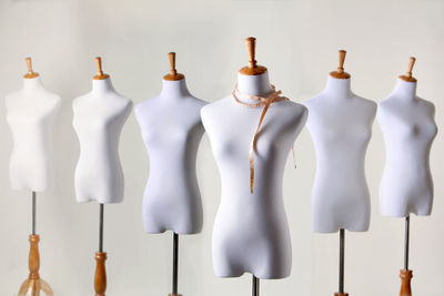 Mannequins over white background